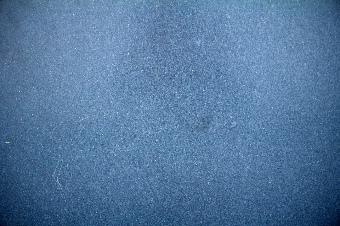 Close-up of blue powder surface, resembling the habitat substrate ideal for Blue Powder Isopods' thriving environment.