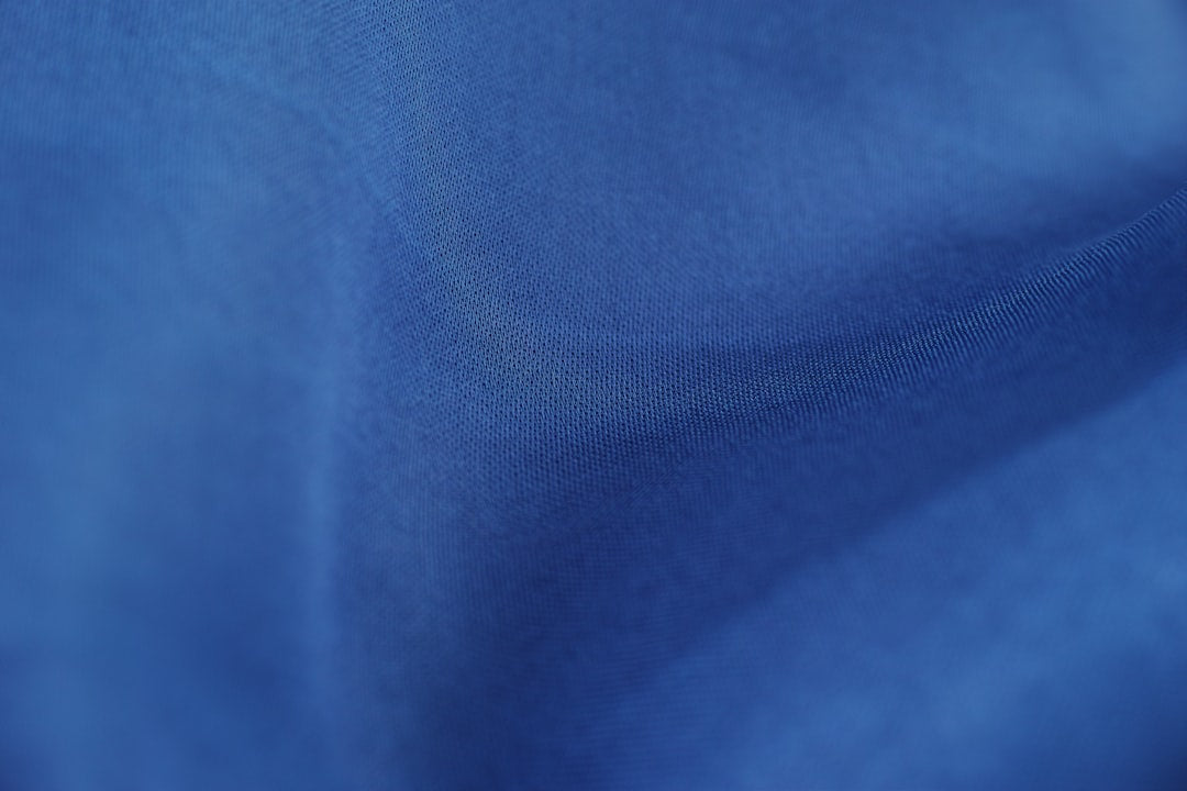 Close-up of powder blue fabric texture, illustrating the coloration related to powder blue isopods in a care guide context.